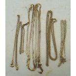 A selection of yellow metal chains,