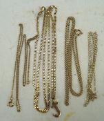 A selection of yellow metal chains,