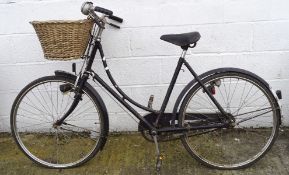 A vintage ladies Pashley push bike, with wicker basket to front,