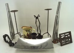 A collection of metalware, including a pair of candlesticks, a door knocker,