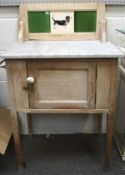 A late 19th/early 20th century pine marble topped wash stand,