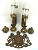 Two GWR lamps and a brass coat of arms,