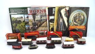 A selection of Hornby OO gauge freight stock and books,