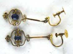 A pair of 9ct gold ladies drop earrings, each set with a single blue stone