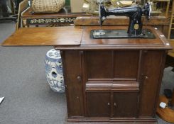 A Singer sewing machine, model EA859133,