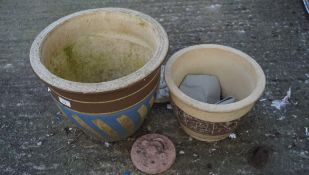 A selection of plant pots and garden accessories