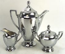 A vintage silver lustre ware ceramic part coffee set, comprising pot, sugar bowl and milk jug,
