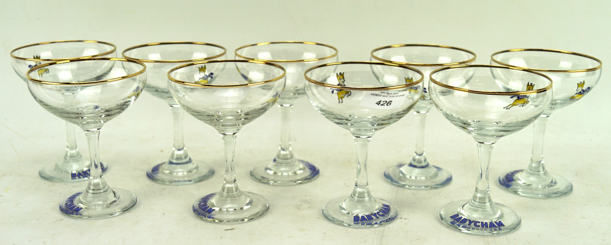 A collection of nine vintage Babycham glasses,