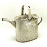 A vintage white enamel watering can,