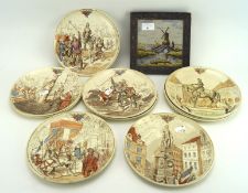 A Delft tile and ten French ceramic plates,