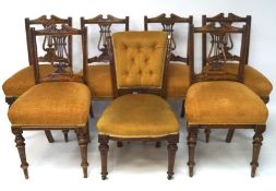 A set of six mahogany framed dining chairs,