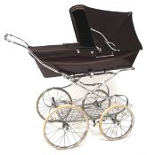 A vintage Silvercross pram baby carriage in brown,
