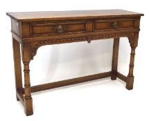 An oak console table,