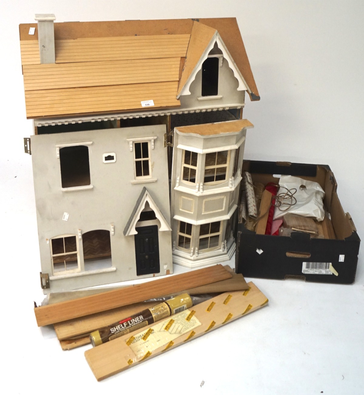 A contemporary part built doll's house,