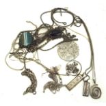 A collection of silver and white metal jewellery