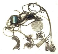 A collection of silver and white metal jewellery