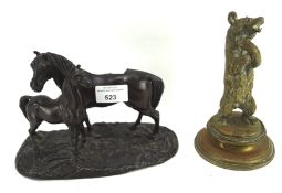 Two metal figures of animals, comprising a spelter figure of a horse and foal, height 14cm,