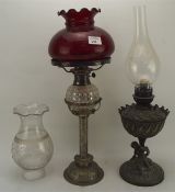 Two silver plated oil lamps,