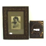 Two photo frames, comprising one copper example and a wood example