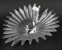 A large art glass fruit bowl, in the form of a stylised shell,