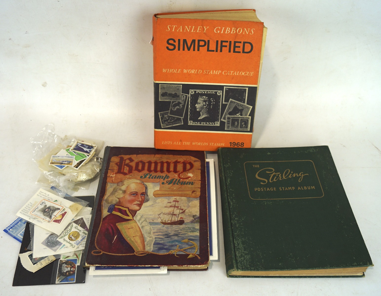 Two 20th century stamp albums, featuring examples from Denmark, Great Britain, and more