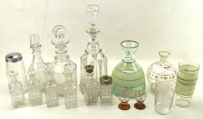 A collection of assorted glassware, to include three decanters, glasses and more,