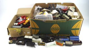 Collection of model railway related wares including tracks, carriages, and more,