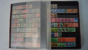 Three stamp books, mostly Japanese and Australian examples