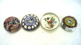 Four 20th century glass paperweights,