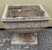 Large square stone planter raised upon pedestal base, height 42cm,