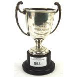A mid century small silver twin handled trophy by Adie Brothers ltd, hallmarked Birmingham 1954,