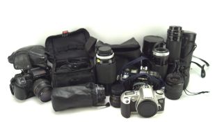 Assorted cameras and lenses,