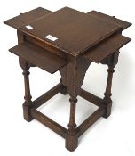 A small oak worktable, with a sliding surface to each side, raised on turned supports,
