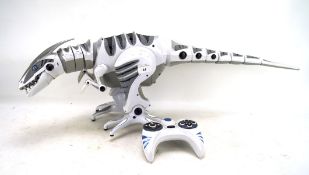 A Jaz Toys remote control white robot dinosaur, with remote control, approx.