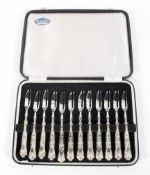 A set of twelve silver handled cake forks awarded to Sir Alf Ramsey by Orient FC, 1972,