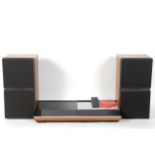 A Bang & Olufsen beocenter 7007 and a pair of Beovox S 80.