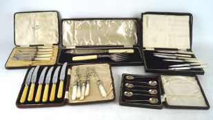Six boxes of silver plated flatware, including knives, forks and spoons,