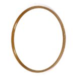 A beech framed circular wall mirror,