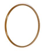 A beech framed circular wall mirror,