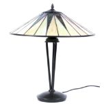 A contemporary Tiffany style table lamp, with starburst pattern glass shade,