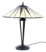 A contemporary Tiffany style table lamp, with starburst pattern glass shade,