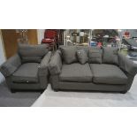 A charcoal two seater sofa and armchar with scatter cushions,