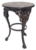 A circular cast iron Britannia head pub table, with decorative pierced detail,