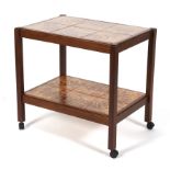 A 1960's two tiered tiled push-pull serving trolley,