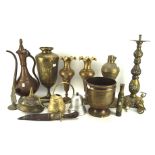 Assorted Middle Eastern brassware, including: vases engraved with scrolling foliage, ewers,