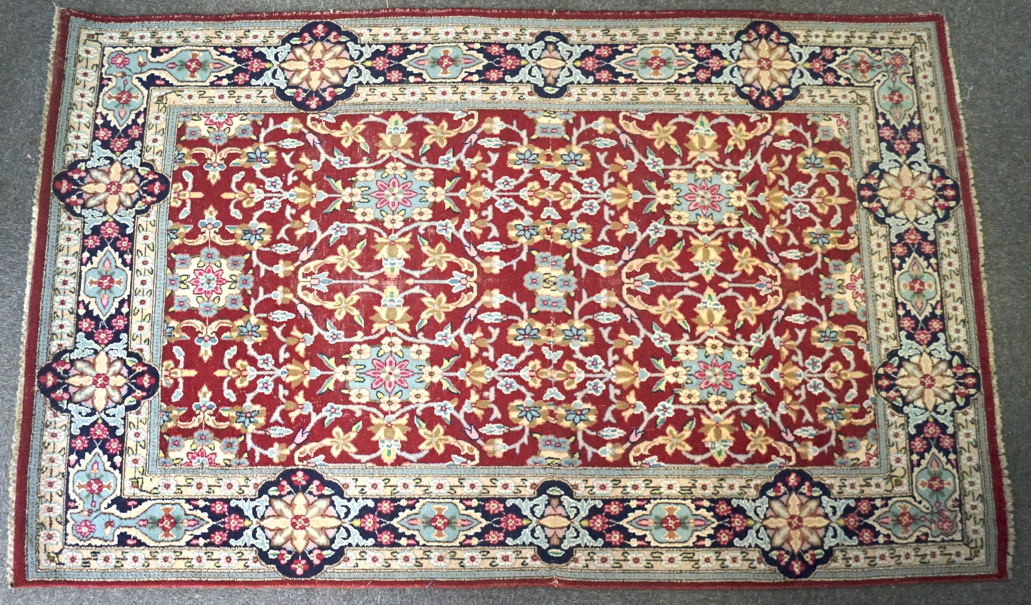 A 20th century woven Persian style rug,