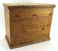 An early 20th century pine box with hinged lid, L46cm x D23.
