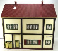 A vintage doll's house named 'Harbour Wynd', mid-century, including some fittings and contents,