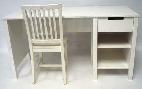 A modern white painted desk with drawer and two shelves together with a similar chair,