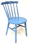 A vintage blue painted kitchen chair, with spindle back, on turned legs,